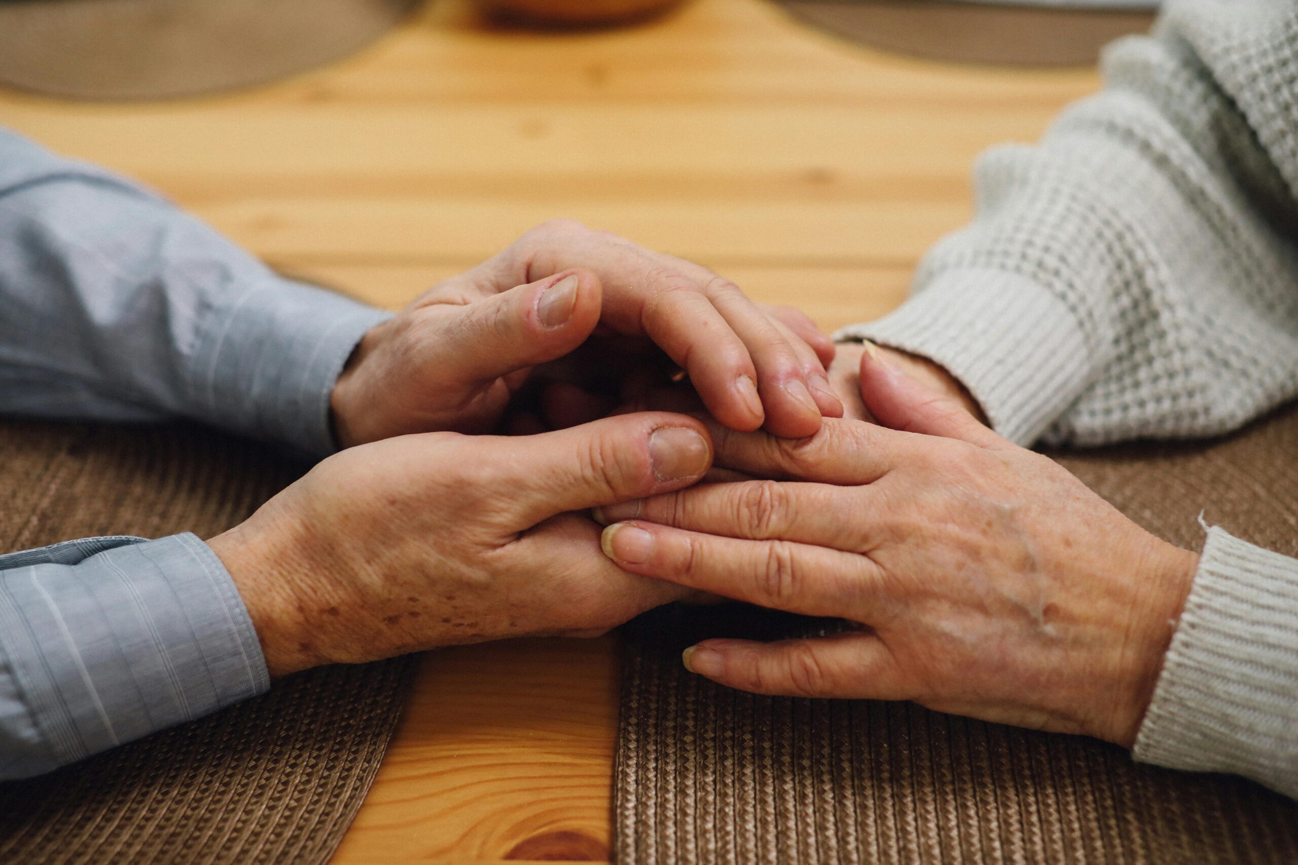 Between Care, Genes, and Systems: Navigating Huntington’s Disease as a Caregiver